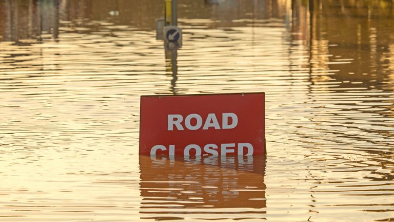 road closed sign due to flood